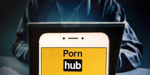Pornographic video sharing website Pornhub logo is seen on