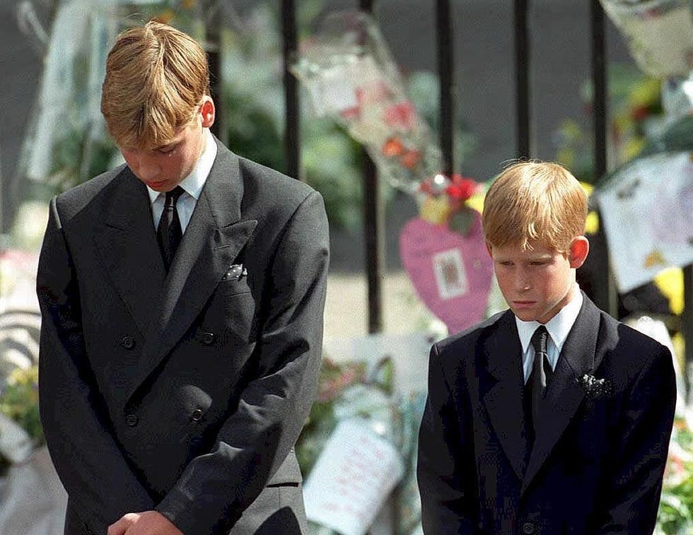 prince william left and prince harry, the sons of diana, princess of wales, bow their heads as their mothers coffin is taken out of westminster abbey 06 september following her funeral service the princess was killed 31 august in a car crash in paris photo credit should read adam butlerafp via getty images