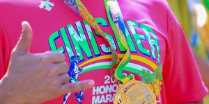 honolulu, hi december 09 finisher medal and t shirt of the honolulu marathon 2018 on december 9, 2018 in honolulu, hawaii photo by tom penningtongetty images for honolulu marathon