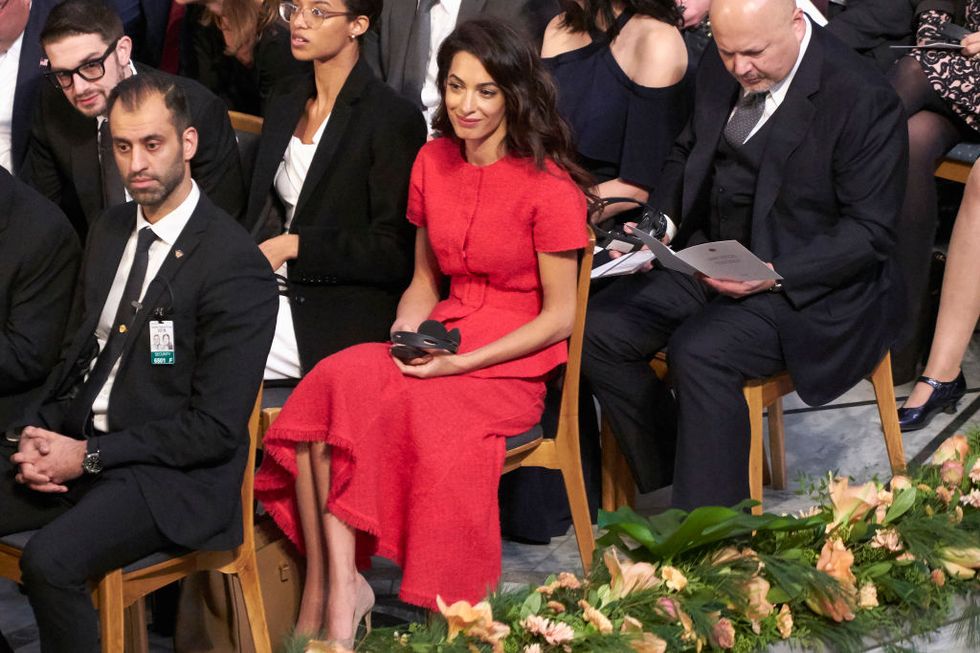 Amal Clooney red oscar de la renta outfit nobel peace prize ceremony 2018