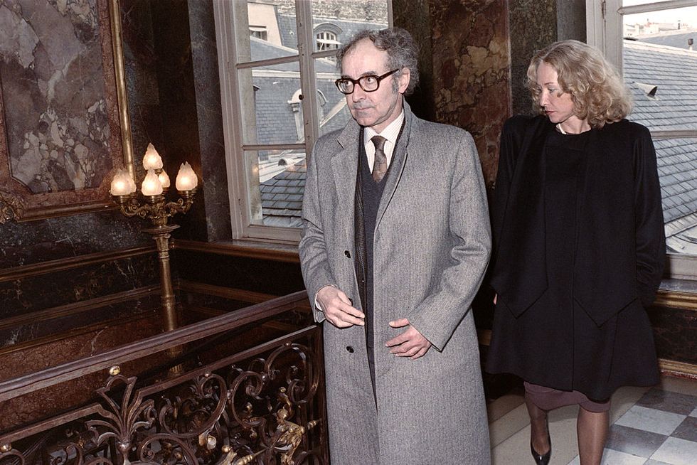 swiss film director jean luc godard and his companion anne marie mieville are pictured at the hotel matignon in paris, on november 25, 1988 afp photo gerard fouet photo credit should read gerard fouetafp via getty images
