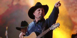 garth brooks performs good ride cowboy during the 39th annual cma awards   garth brooks performs in times square at times square in new york city, new york, united states photo by j kempinfilmmagic
