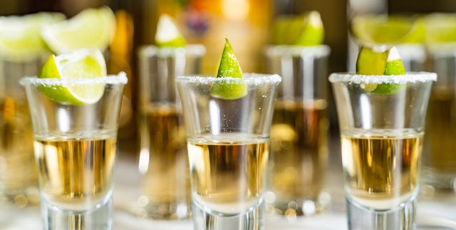 Glasses of alcohol and lime on the restaurant table. Glasses of alcohol and lime on the restaurant table.