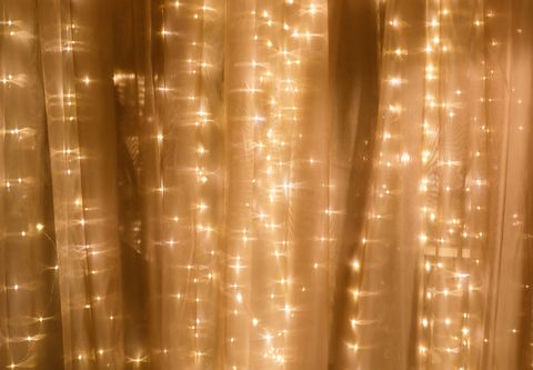 soft curtain with string lights