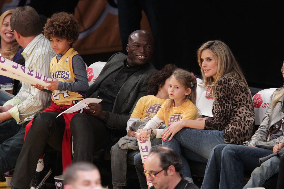los angeles, ca   january 07  l r henry samuel, seal, leni samuel, and heidi klum attend a game between the new orleans hornets and the los angeles lakers at staples center on january 7, 2011 in los angeles, california  photo by noel vasquezgetty images