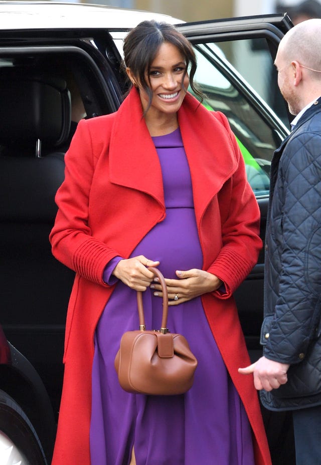 Fashion, Street fashion, Electric blue, Outerwear, Fashion accessory, Coat, Vehicle, Compact car, Scarf, 