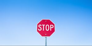 Sky, Stop sign, Red, Sign, Signage, Blue, Traffic sign, Street sign, Cloud, 