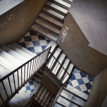 staircase inside an old residential building in catania, italy