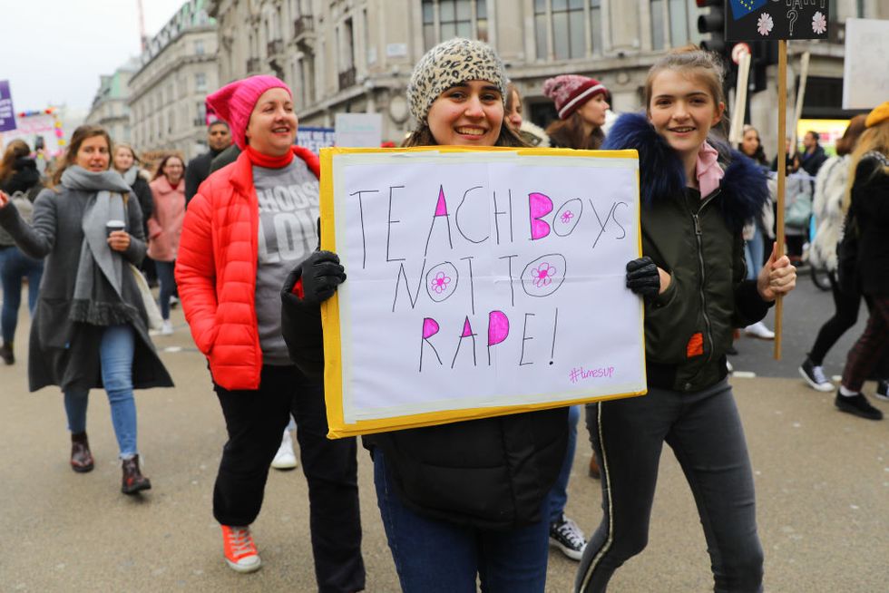 Women with banners at the Bread and Roses Women's March on January 19, 2019 in London, England. The event was dubbed the 'Bread and Roses March' based on the strikes of the same name by textile workers in Massachusetts in 1912 and 'Bread and Roses' is the title of a poem by American poet James Oppenheim about the strikes.