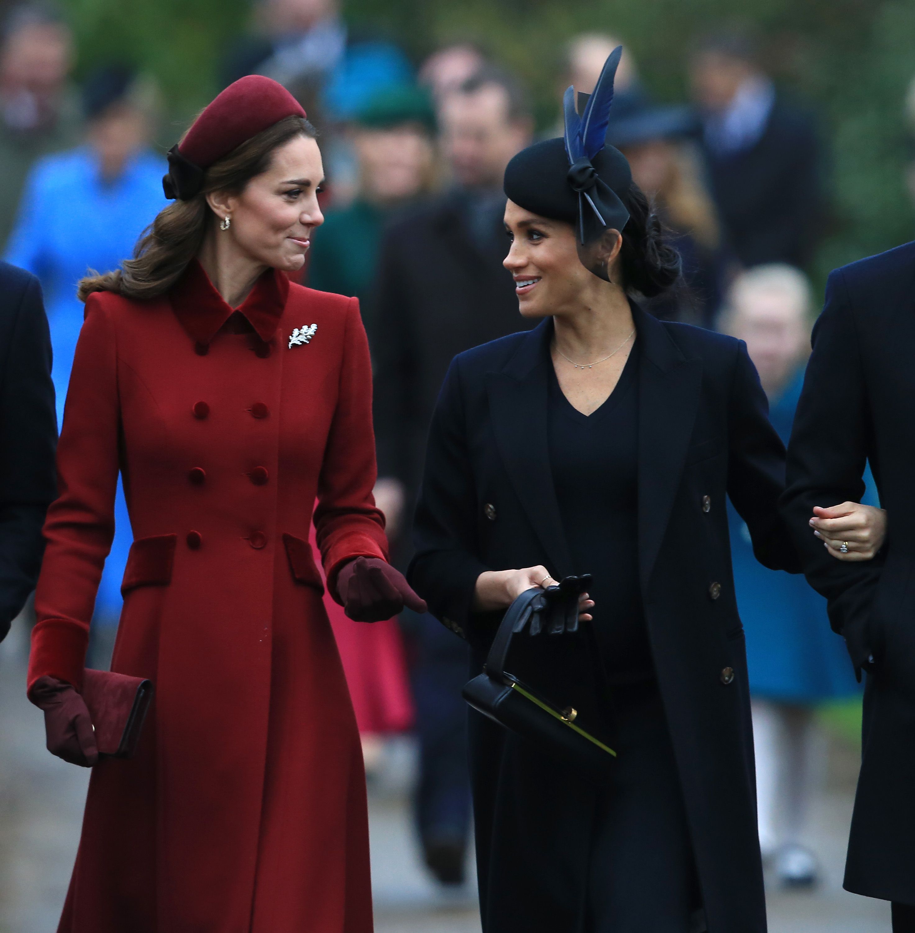 Meghan Markle smiles warmly at Princess Charlotte as the Royal