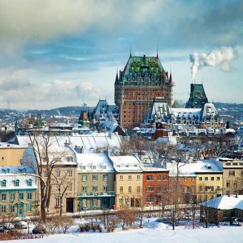 elevated view of the quebec city skyline during partially sunny winter day with just a hint of snow, looking towards the old city and the chateau frontenac
