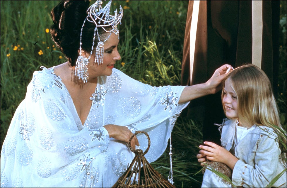 elizabeth taylor and patsy kensit on the set of 'the blue bird', directed by george cukor in 1976