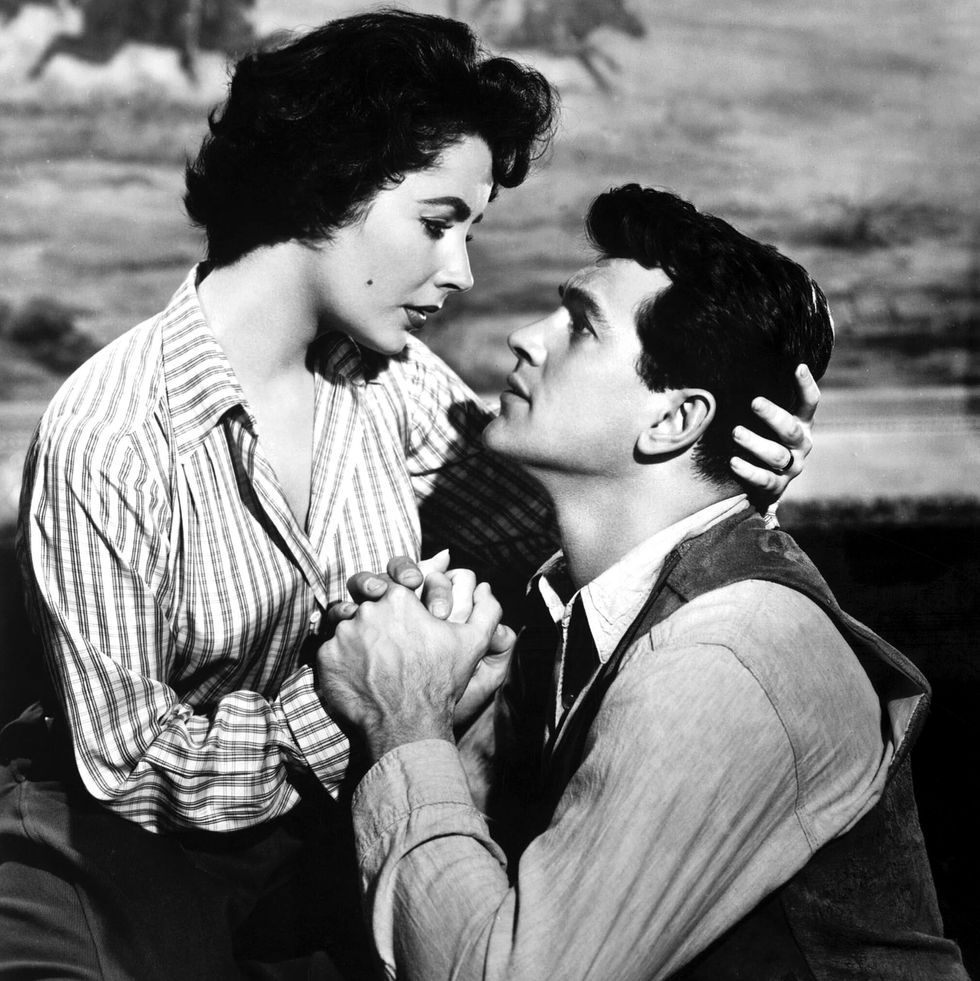 elizabeth taylor with rock hudson r on the film set of of giant directed by george stevens in 1956  photo by apigammagamma rapho via getty images