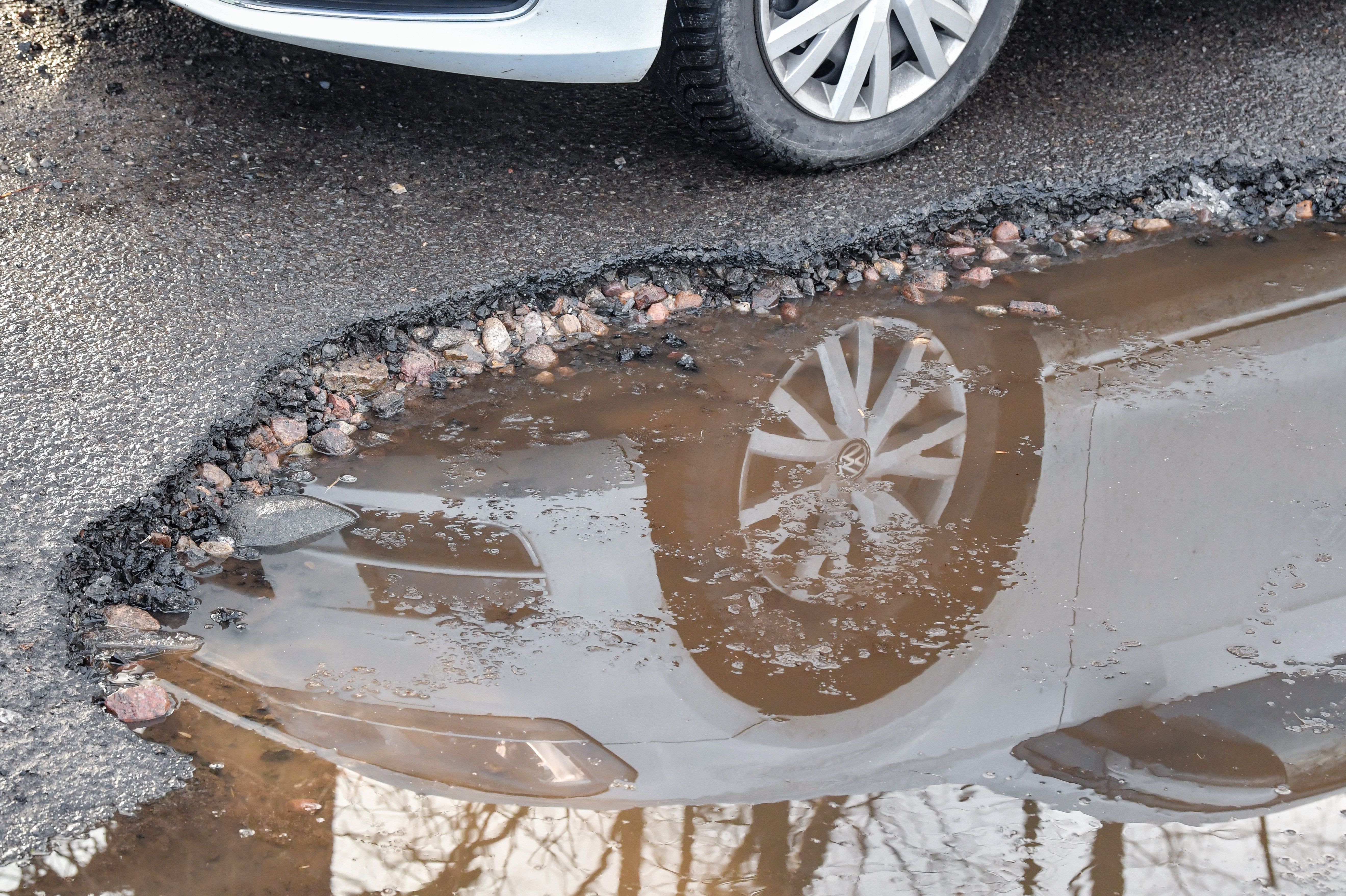 Michigan Drivers Show New Governor Their Photos of Cars Road Damage