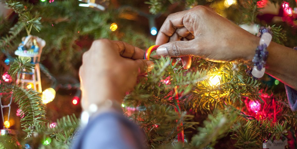 Woman decorating the Christmas Tree