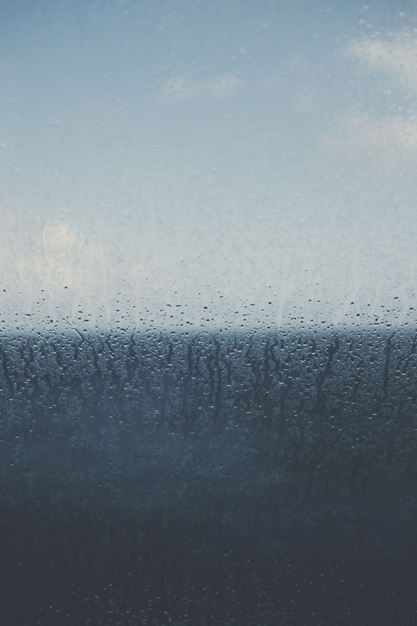 Raindrops and condensation on window