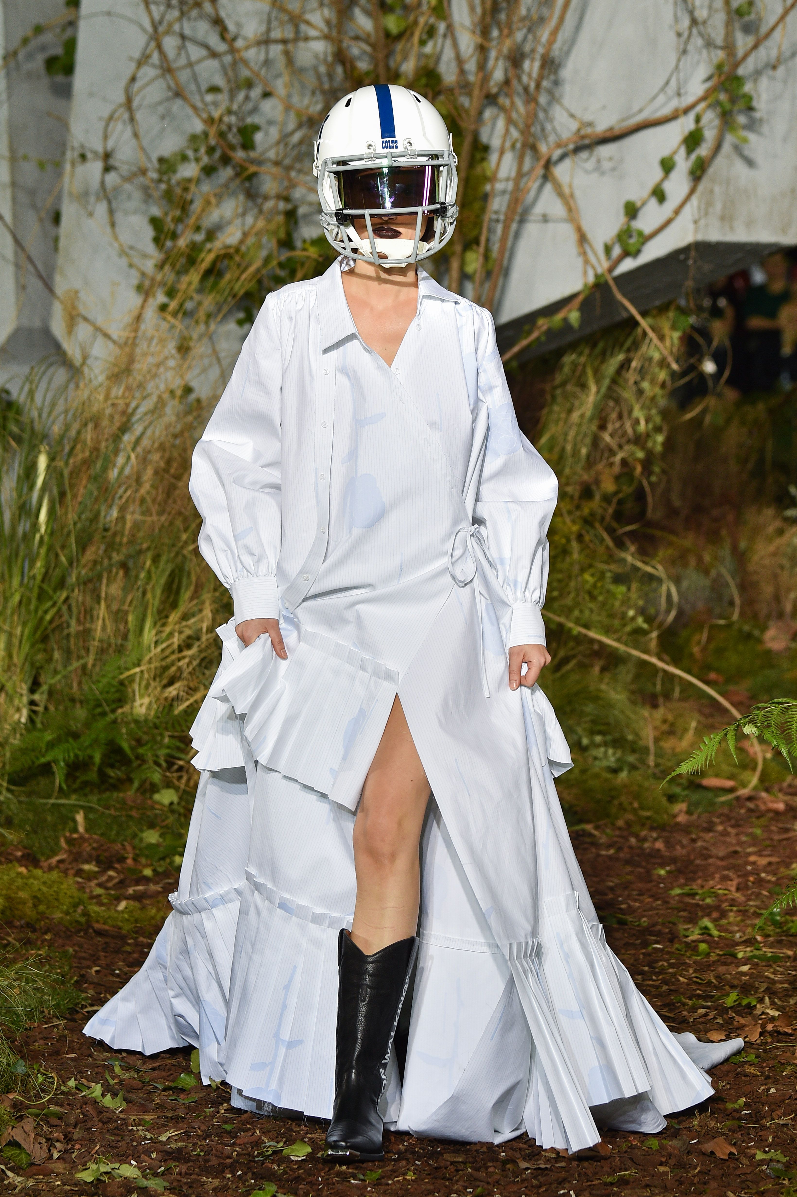 Football helmets are randomly popping up in Paris during Fashion Week 