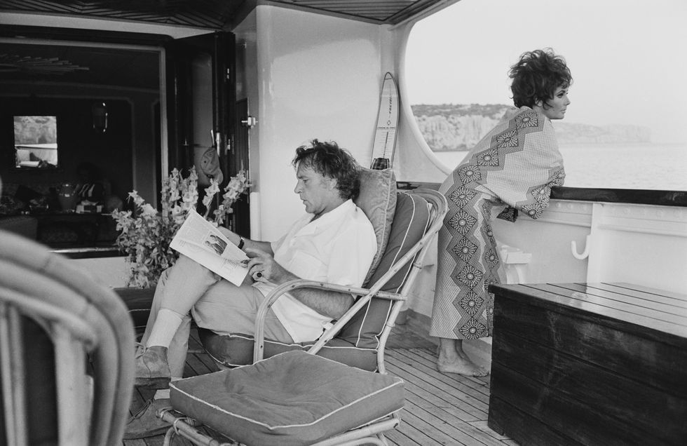 28th august 1967 actor richard burton 1925  1984 with his wife, actress elizabeth taylor 1932   2011, relaxing on their yacht kalizma, off the coast of capo caccia in sardinia, during the filming of goforth, later titled boom photo by david cairnsgetty images