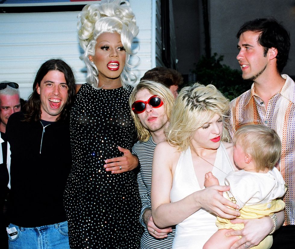 rupaul 2nd from left with dave grohl, kurt cobain and krist novoselic of nirvana, and courtney love with daughter frances bean cobain photo by jeff kravitzfilmmagic, inc