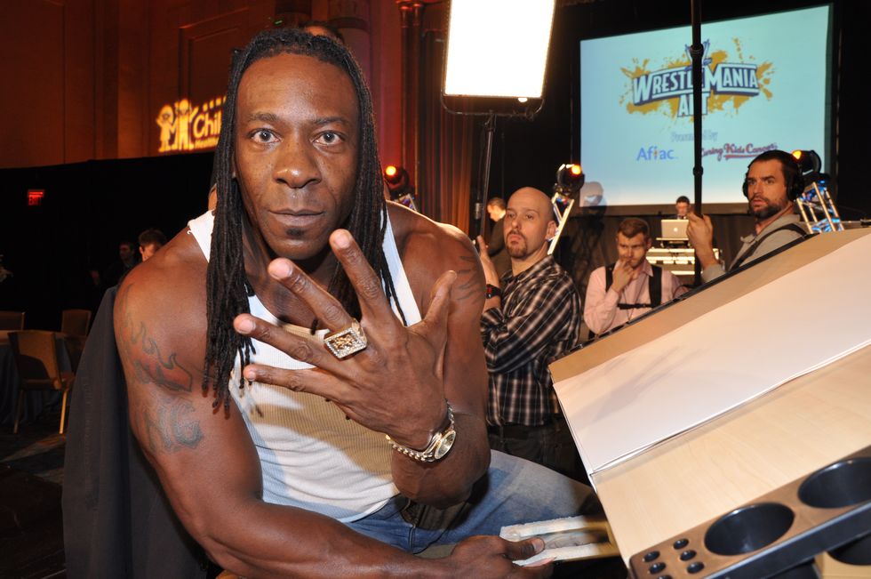 Booker T attends WWE's 4th annual WrestleMania art exhibit and auction at The Egyptian Ballroom at Fox Theatre on March 30, 2011, in Atlanta, Georgia