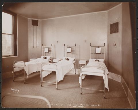 Interior of a ward at Sloane Maternity Hospital at Amsterdam Avenue and 59th Street, three women in beds visible, New York, New York, late 1890s.