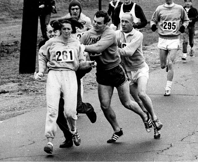 ashland, ma april 19 kathy switzer roughed up by jock semple during boston mararthon photo by paul j connellthe boston globe via getty images
