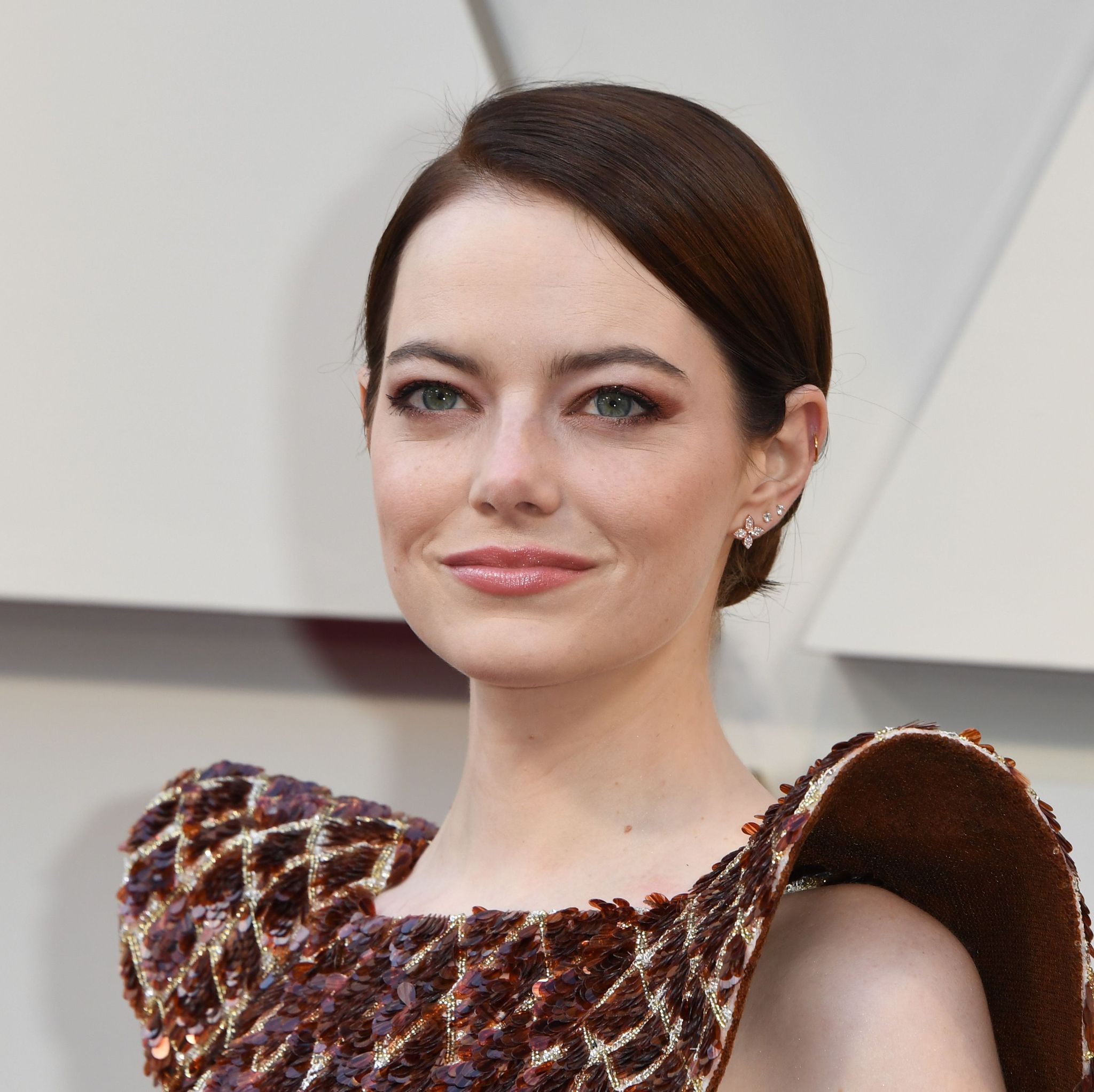 Emma Stone, latest Louis Vuitton ambassador, wearing a gown from