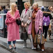 new york, new york   february 08 charlotte groeneveld is seen wearing pink teddy coat, mary lawless lee and a guest wearing brown leather pants outside kate spade during new york fashion week autumn winter 2019 on february 08, 2019 in new york city photo by christian vieriggetty images
