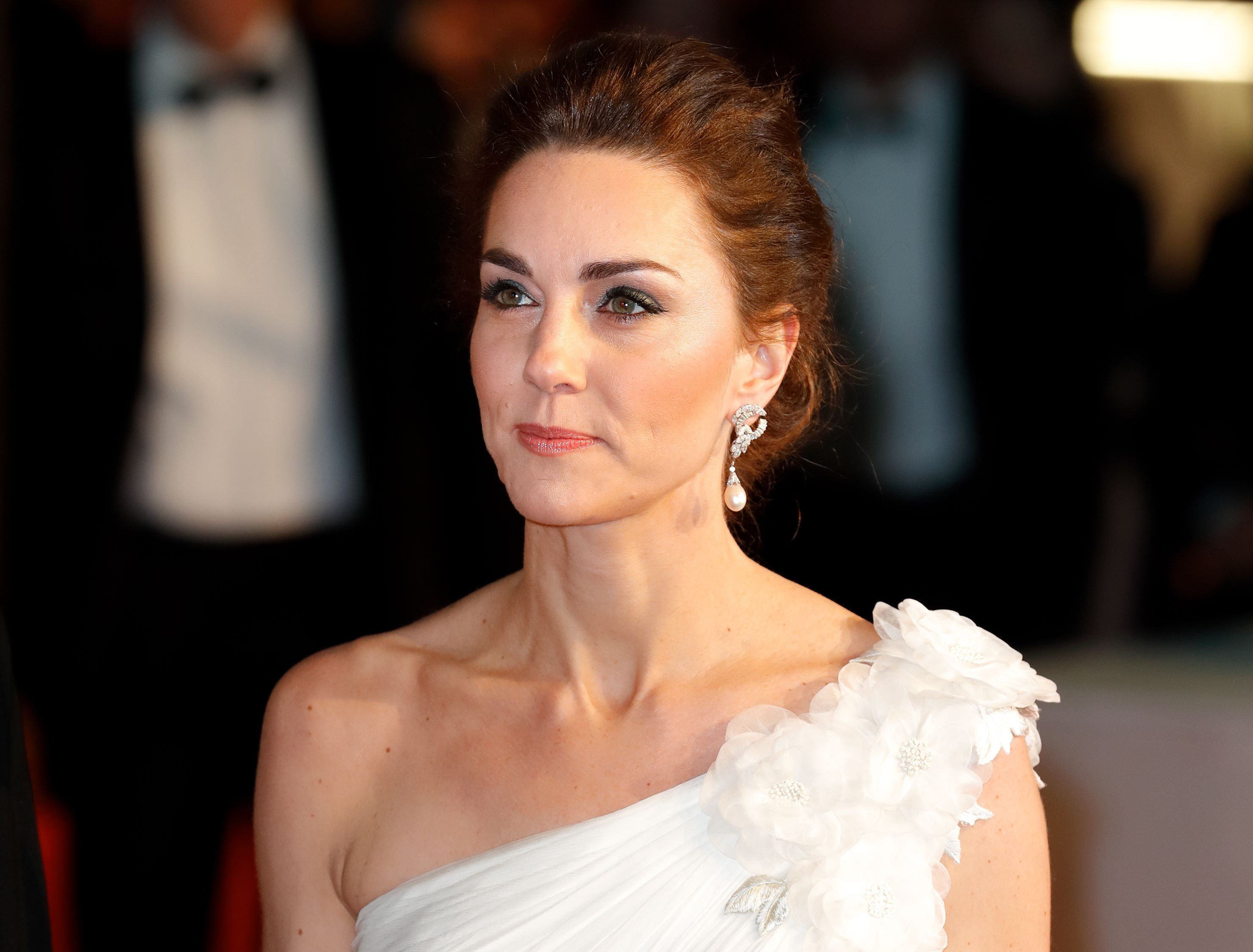 Kate Middleton stuns on BAFTA red carpet in white and gold gown | Bafta red  carpet, Royal gown, Prince william and kate