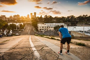 a man walking on a road