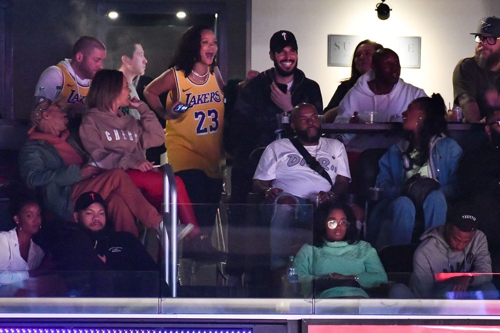 Rihanna and Hassan Jameel at a Lakers Game