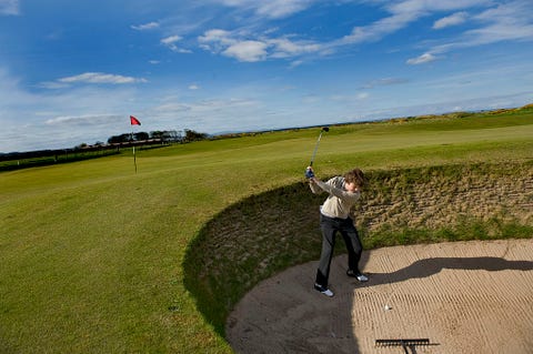 A student at St. Andrews's Old Course