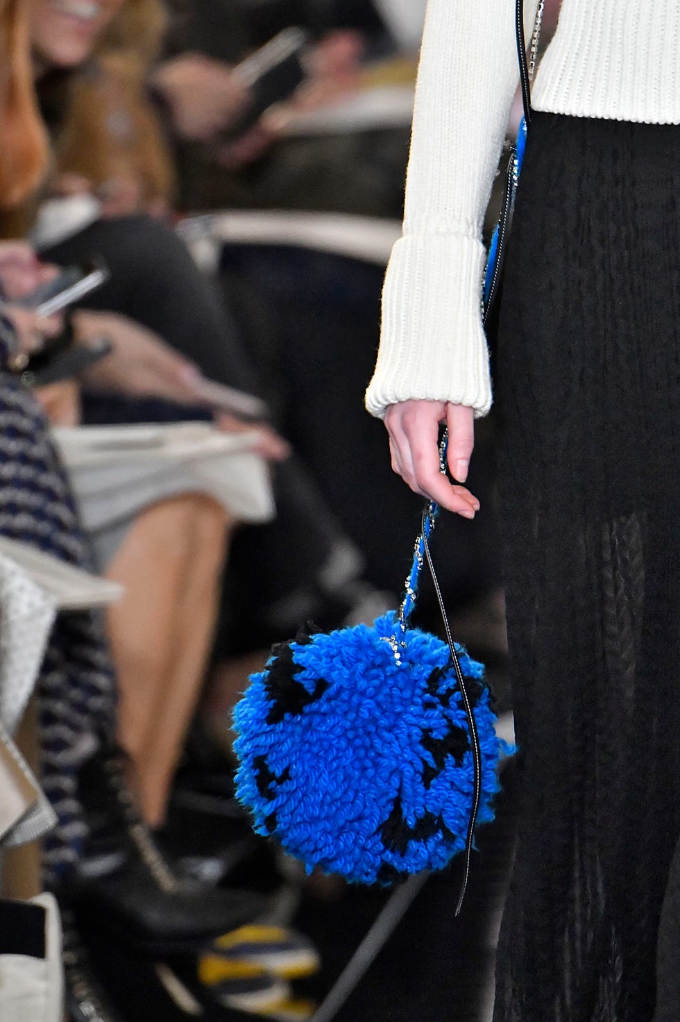 Blue, Cobalt blue, Electric blue, Fashion, Human, Cheerleading, Hand, Street fashion, Pom-pom, Haute couture, 