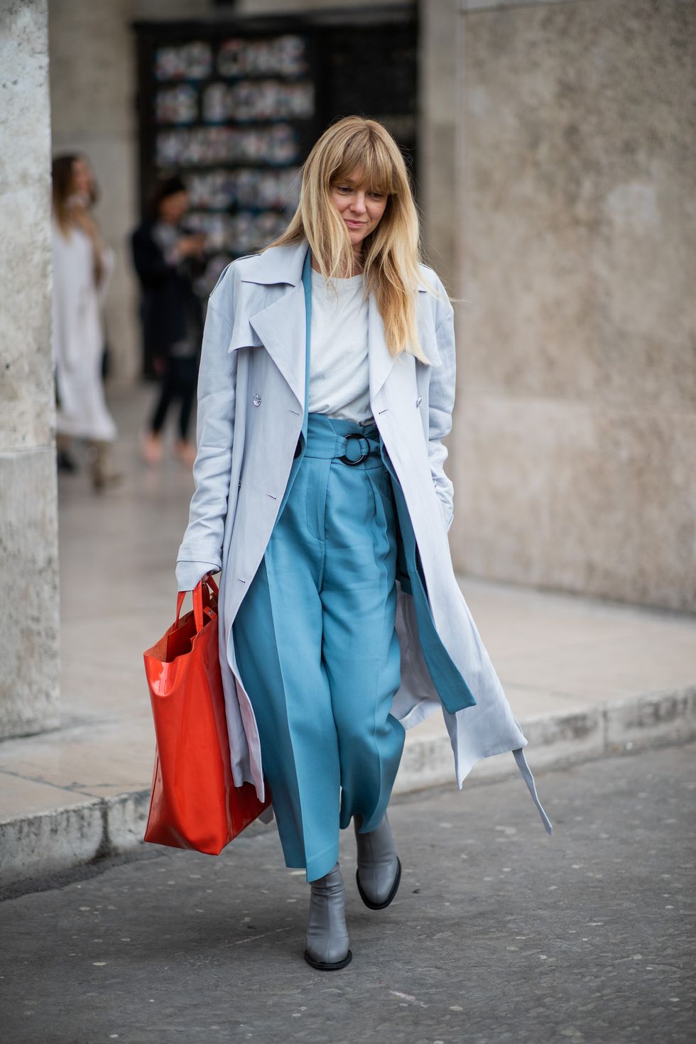 paris, france   march 02 jeanette friis madsen is seen wearing oversized red bag, blue coat outside cédric charlier during paris fashion week womenswear fallwinter 20192020 on march 02, 2019 in paris, france photo by christian vieriggetty images