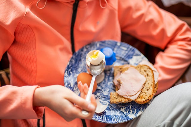 a person eating a plate of food