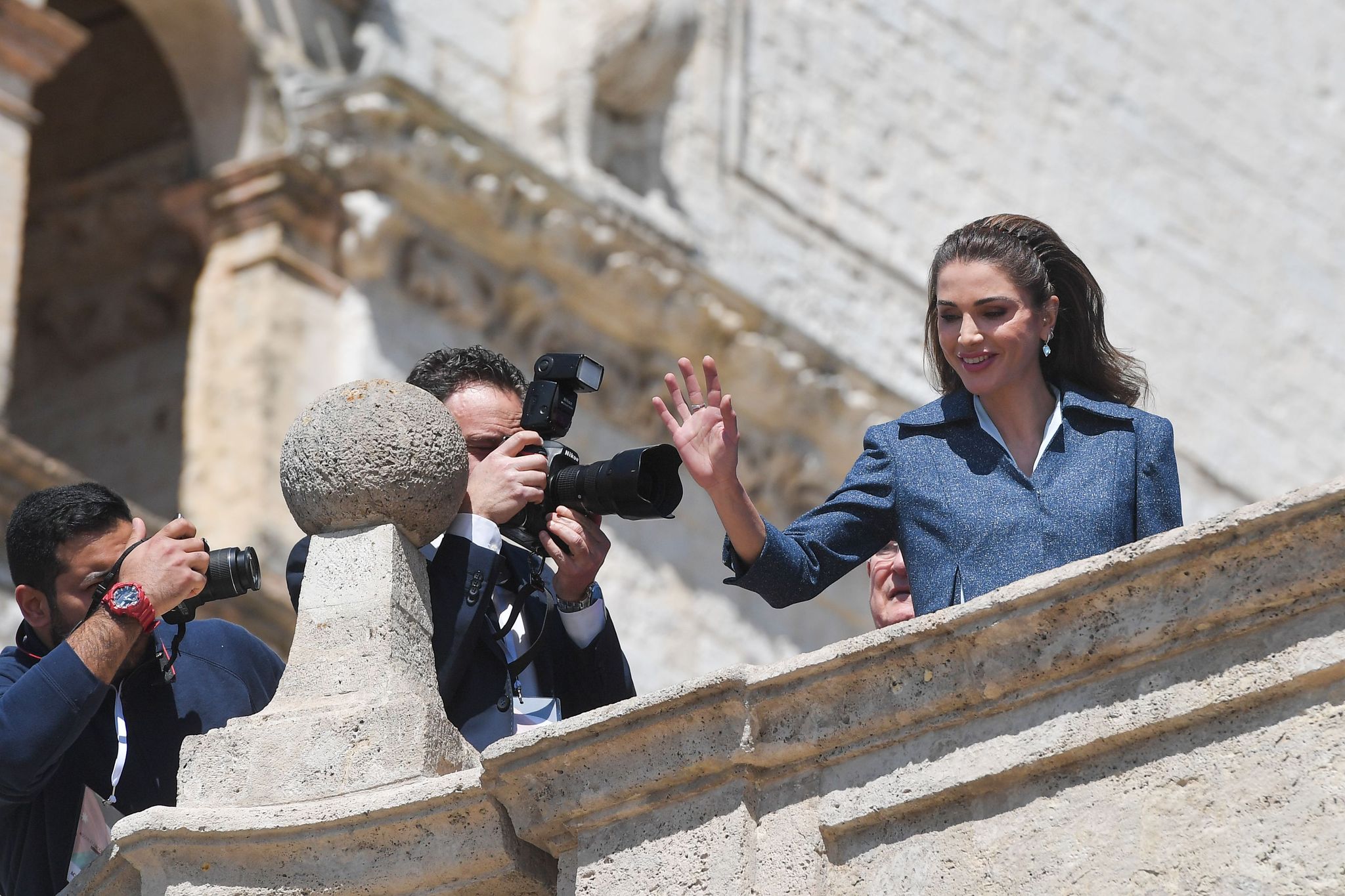 queen rania of jordan r waves upon her arrival for a ceremony at the basilica of st francis of assisi, on march 29, 2019 in assisi, to hand the lamp of the peace of st francis, the catholic nobel to jordans king   king of jordan, abdullah ii receives the lamp of the peace of st francis, the catholic nobel during a ceremony the basilica of st francis of assisi, on march 29, 2019 in assisi  photo by tiziana fabi  afp        photo credit should read tiziana fabiafp via getty images