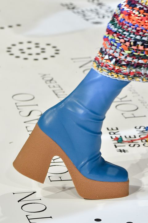 Footwear, Blue, Shoe, Ankle, High heels, Leg, Fashion, Electric blue, Font, Human leg, 
