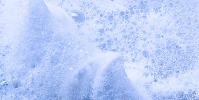 Wave of bubbles in water with a blue color