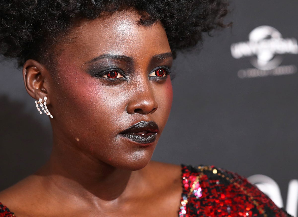 Lupita Nyong'o Wore Red Contacts at The London Premiere of Us