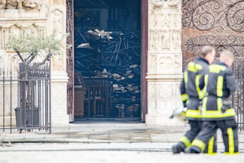 fire fighters notre dame cathedral damage day after