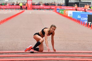 Hayley Carruthers crawls over London Marathon finish line