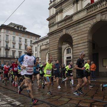 milan, italy april 07 runners pass by teatro la scala while competing during the 19th edition of the milan marathon on april 7, 2019 in milan, italy the generali milano marathon is an annual running competition awarded with an iaaf silver label road race photo by emanuele cremaschigetty images