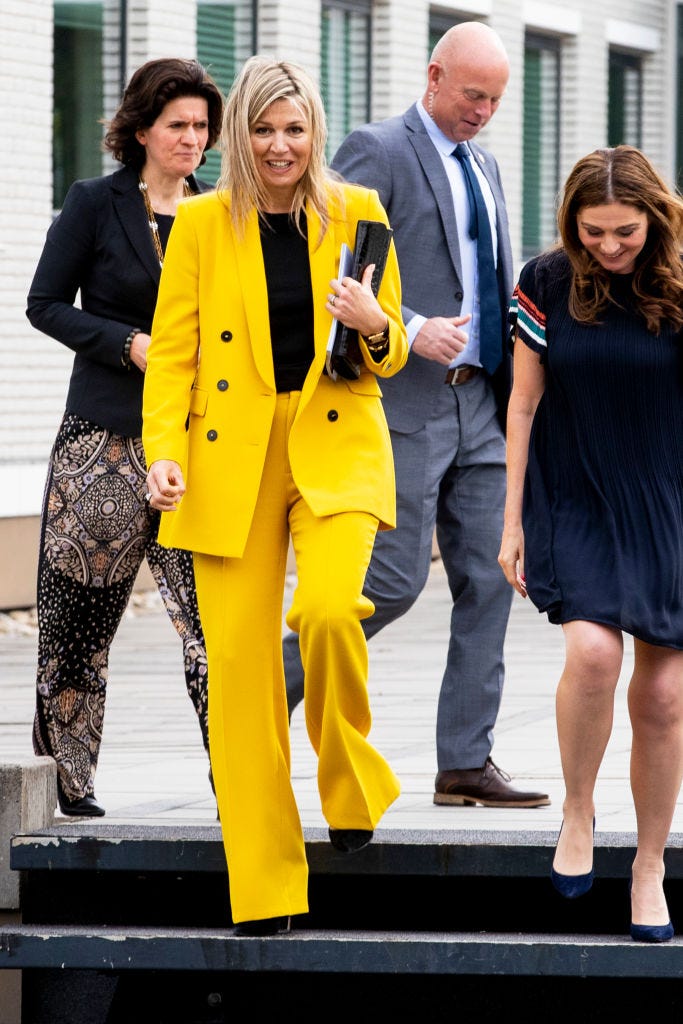 Yellow, Street fashion, Clothing, Suit, Fashion, Pantsuit, Outerwear, Hairstyle, Blazer, Blond, 