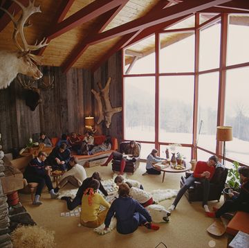 a group of people relaxing at the chalet of stockbroker a albert sack jr, at the sugarbush mountain ski resort in warren, vermont, circa 1960 photo by slim aaronsgetty images