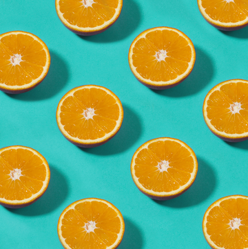 Orange Fruit Pattern on Blue Background