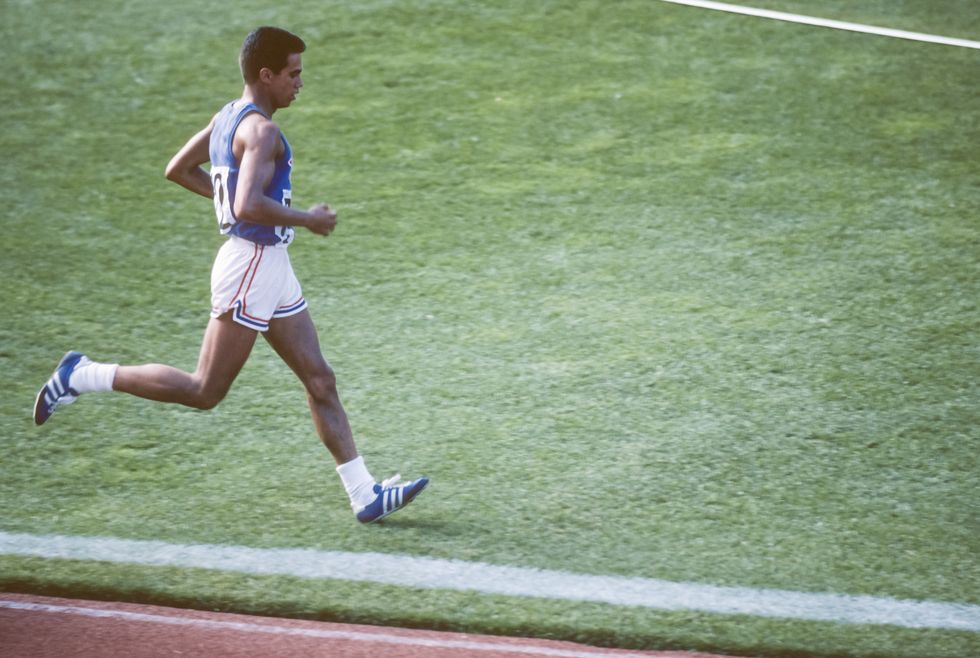 edmonton, canada   october 11  actor robby benson 722 of the usa plays the role of billy mills in the movie running brave filmed in commonwealth stadium in edmonton, canada in this photograph taken october 11, 1982 on location during production of the film  the movie recreates billy mills historic win in the 1964 olympic games 10000 meter racephoto by david madisongetty images