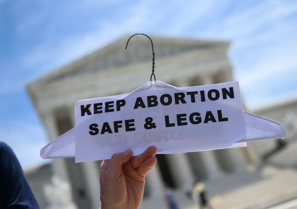 topshot abortion rights activists rally in front of the us supreme court in washington, dc, on may 21, 2019 demonstrations were planned across the us on tuesday in defense of abortion rights, which activists see as increasingly under attack the day of action rallies come after the state of alabama passed the countrys most restrictive abortion ban, prohibiting the procedure in all cases, even rape and incest, unless the mothers life is at risk alabama is among about 14 states which have adopted laws banning or drastically restricting access to abortion, according to activists photo by andrew caballero reynolds afp photo by andrew caballero reynoldsafp via getty images