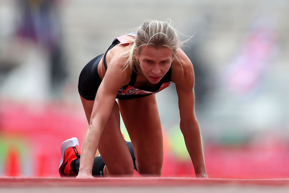 Hayley Carruthers crawls over london marathon finish line