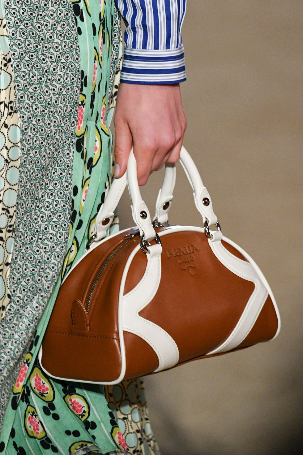 new york, new york   may 02 accessory detail of prada handbag held by a model walking the runway during the prada resort 2020 collection on may 02, 2019 in new york city photo by mike coppolagetty images