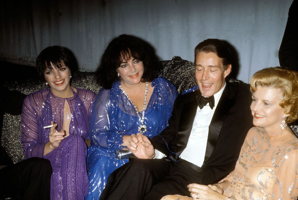 united states   january 22  elizabeth taylor with liza minnelli and halston and betty ford at studio 54 in nyc 1977  photo by vinnie zuffantegetty images
